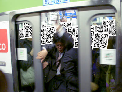 me escaping from a train full of salarymen with qr code faces